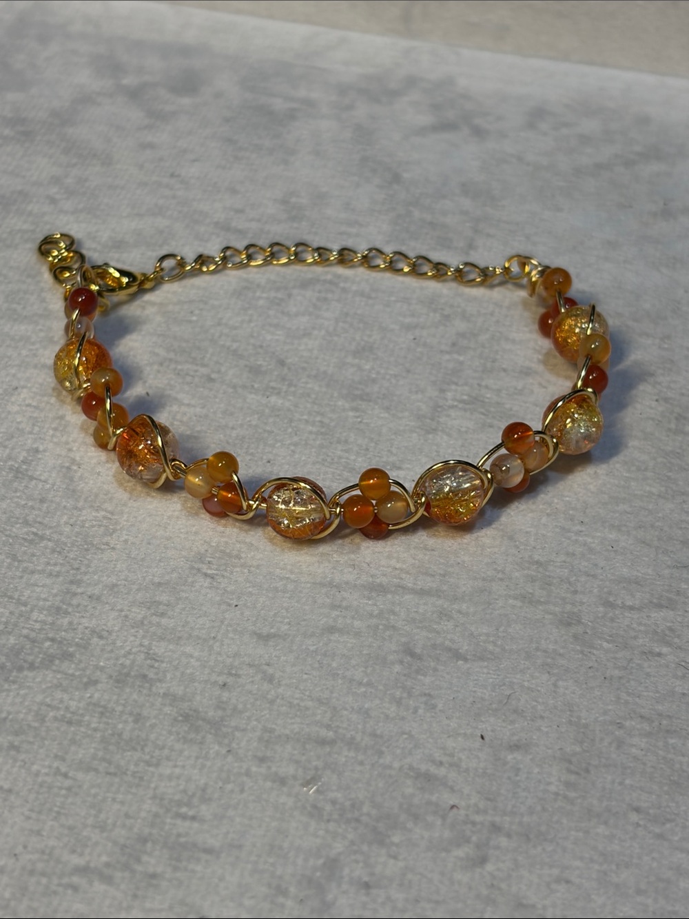 Gold-Tone Orange Glass Bead Wire Weave Bracelet